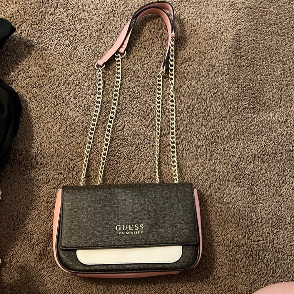 Brown/Pink/White Guess brand purse. Able to wear as shoulder bag or crossbody.